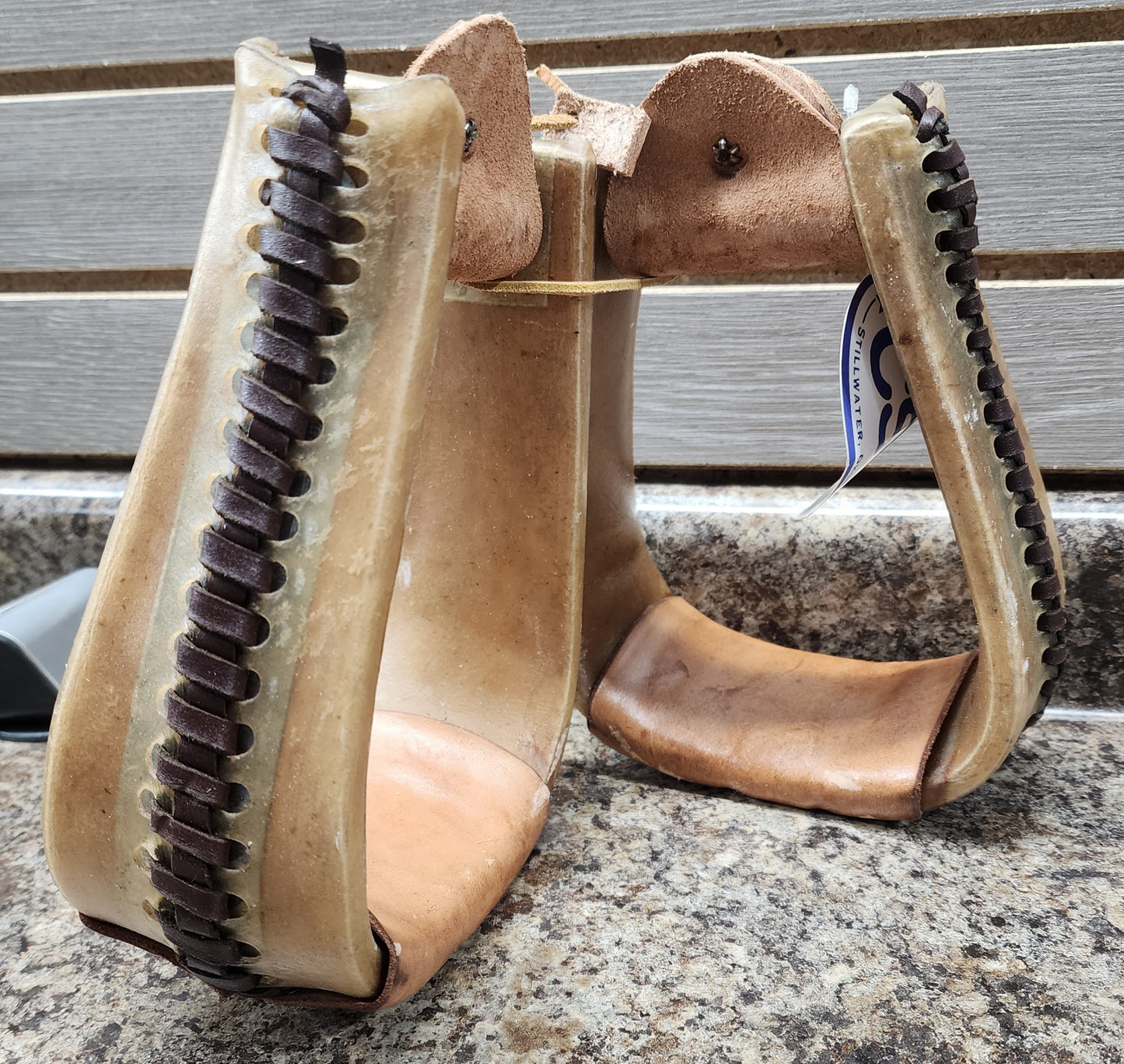 CST Rawhide Covered Deep Roper Stirrups