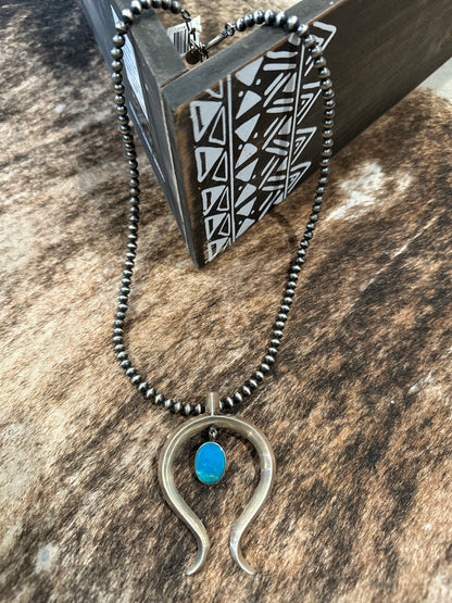 Naja Pendent with Oval Turquoise Pendulum