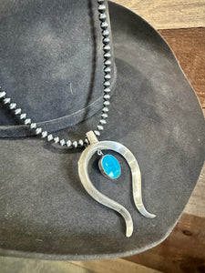 Naja Pendent with Oval Turquoise Pendulum