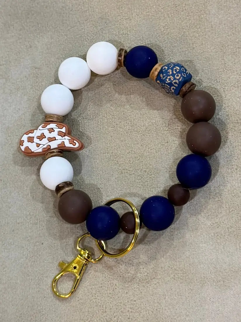 Silicone Bead Wristlet Keychain 21. Navy/ Brown/ Hat Human Accessories