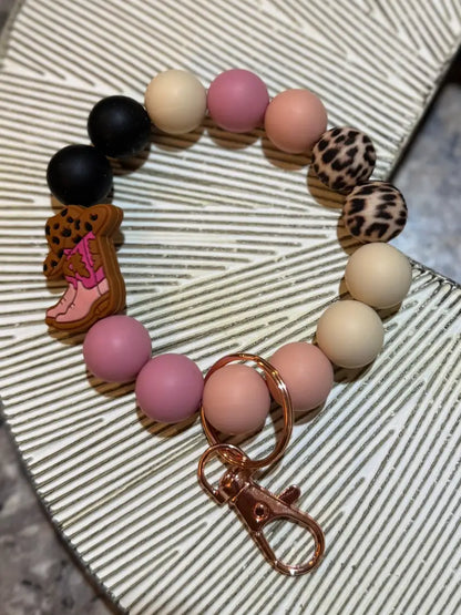 Silicone Bead Wristlet Keychain 22. Pink/ Orange/ Boots Human Accessories