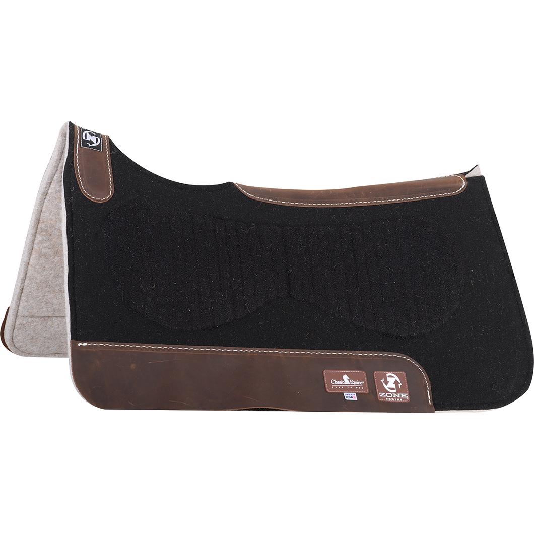 Powered with a vented Zoombang™ insert that is scientifically engineered to dissipate energy, reducing injury and stress on equine athletes. Its breathable design remains securely in place, providing conformal layered protection. 1/8” blended felt top is designed to be used alone as a training pad or under a show blanket. Its durable orthopedic grade felt bottom absorbs moisture, remains soft and pliable, and provides excellent shock absorption. 1” total pad thickness.